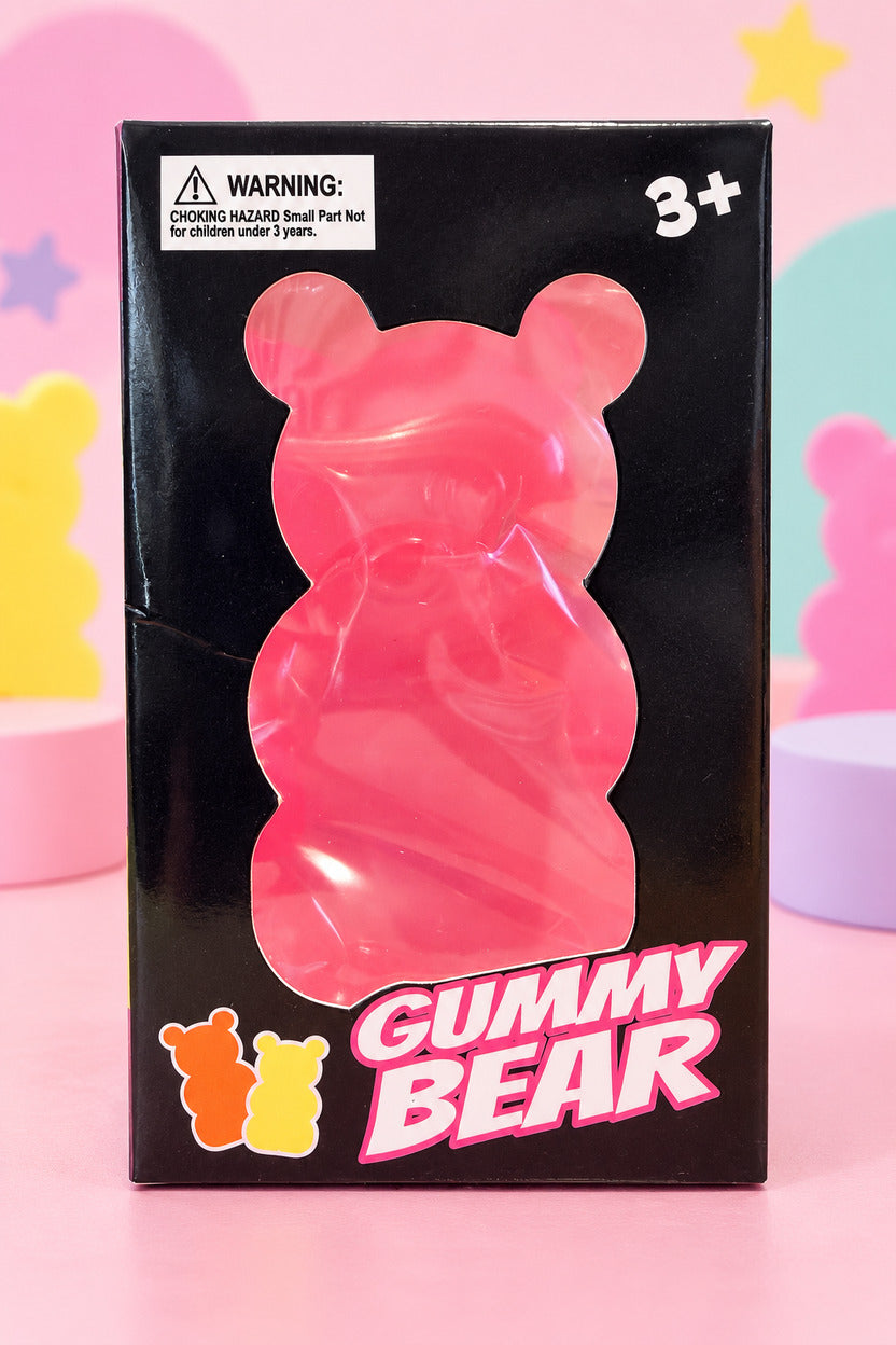 Pink Gummy Bear squishy toy in its black window box, ages 3 and up