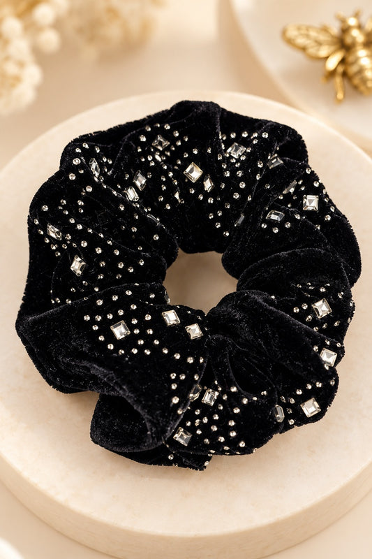 Black rhinestone-trim scrunchie with gathered plush fabric and elastic center