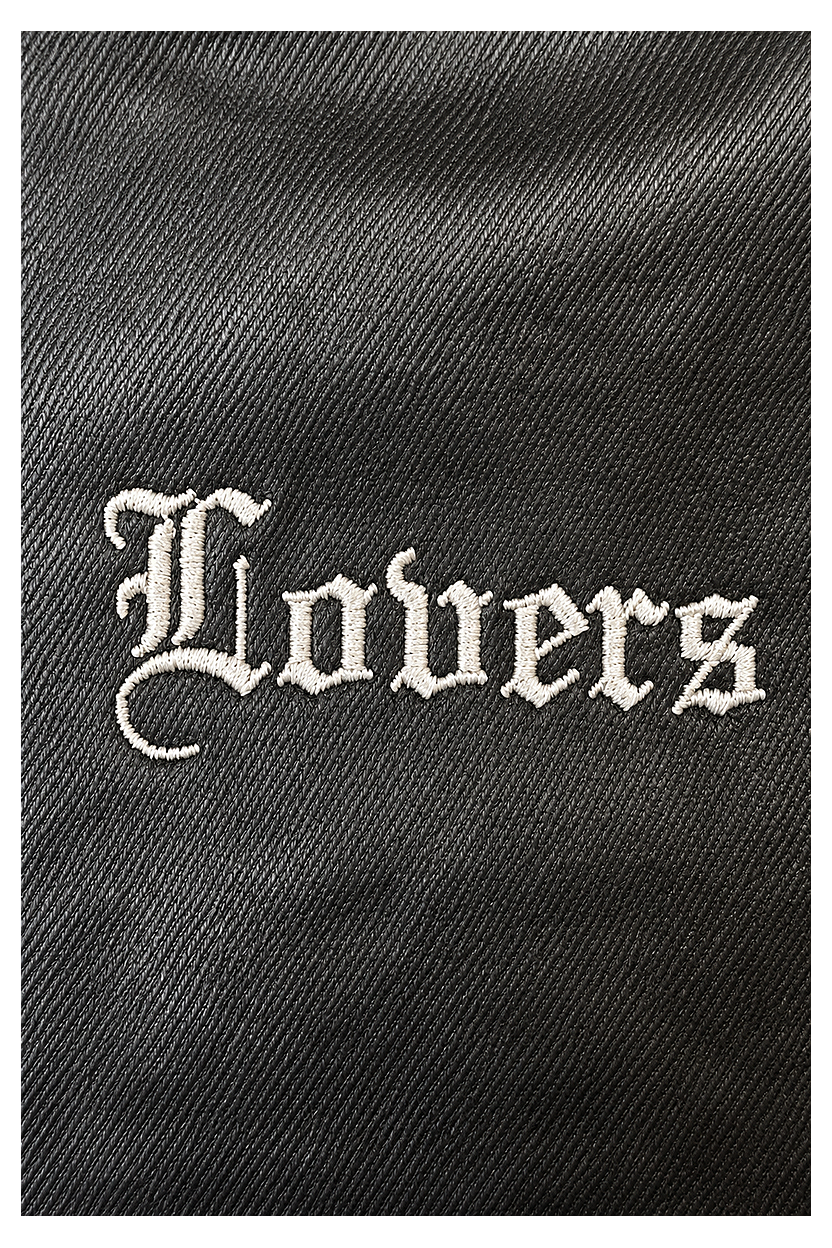 LUTI WAX slim trousers — Lovers embroidery close-up
