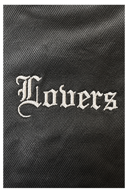 LUTI WAX slim trousers — Lovers embroidery close-up