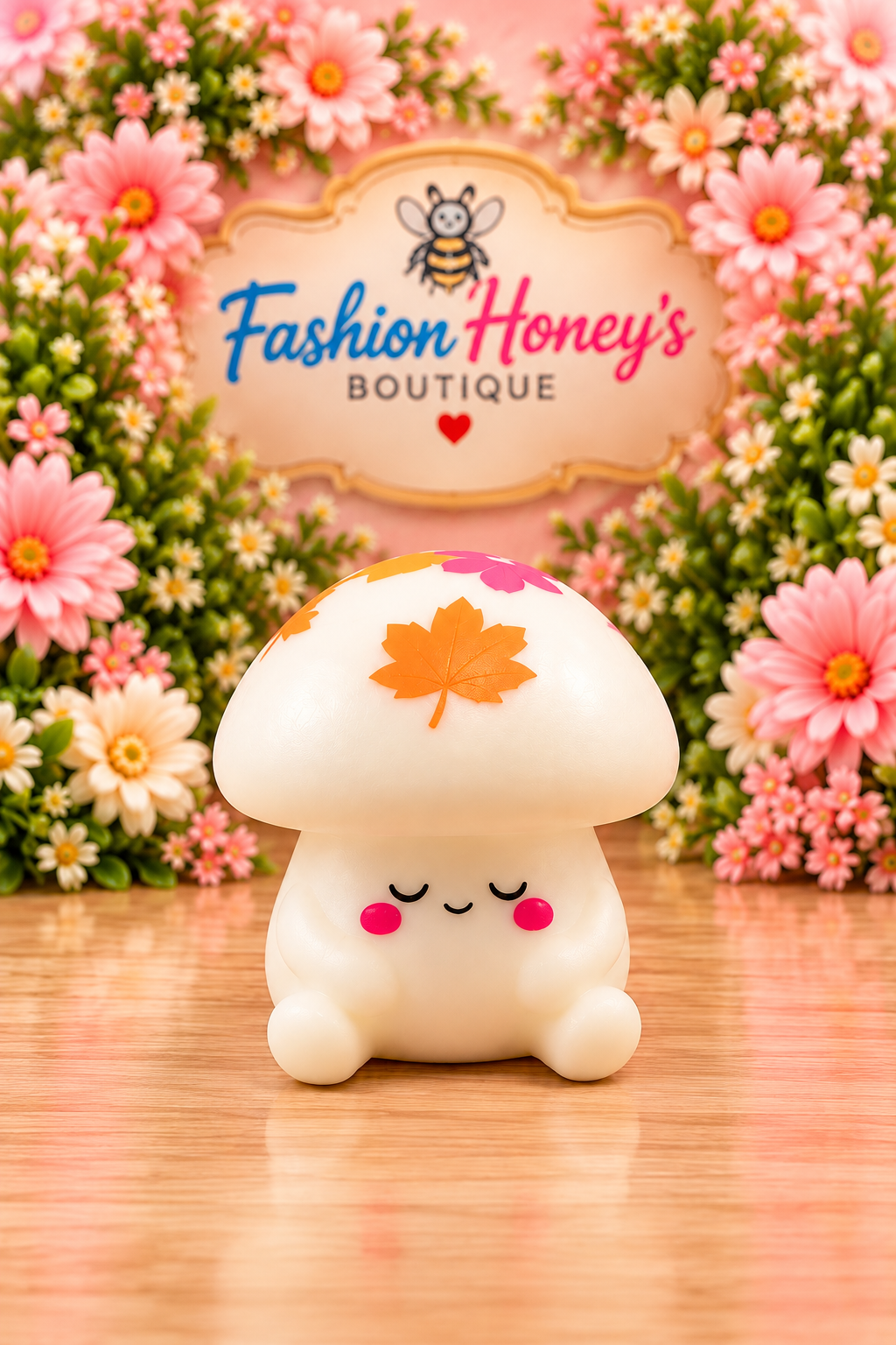 Cream white mushroom squishy with orange and pink cap decorations and sleepy face