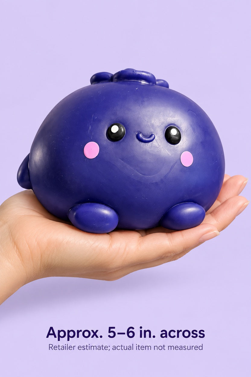 Blueberry squishy in an adult hand for approximate size comparison; estimated 5 to 6 inches across