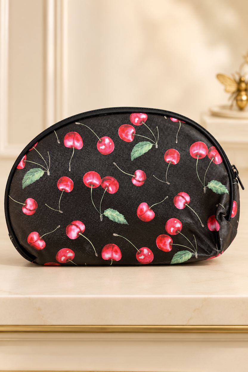 black background, realistic watercolor-style red cherries and green leaves, fine stems; black zipper and piping cherry-print makeup bag. One selected bag per purchase.