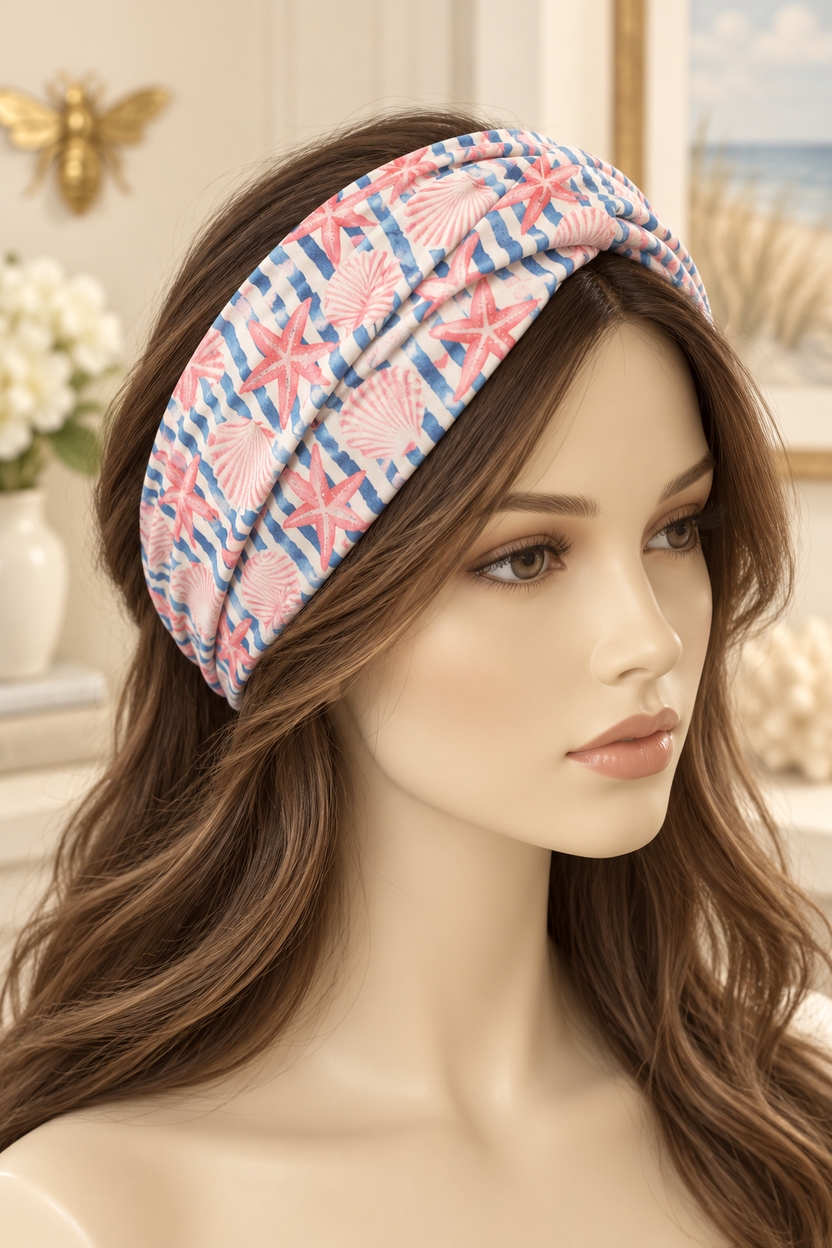 Blue Stripe & Coral Shells scarf headband displayed broadly on a mannequin with long hair
