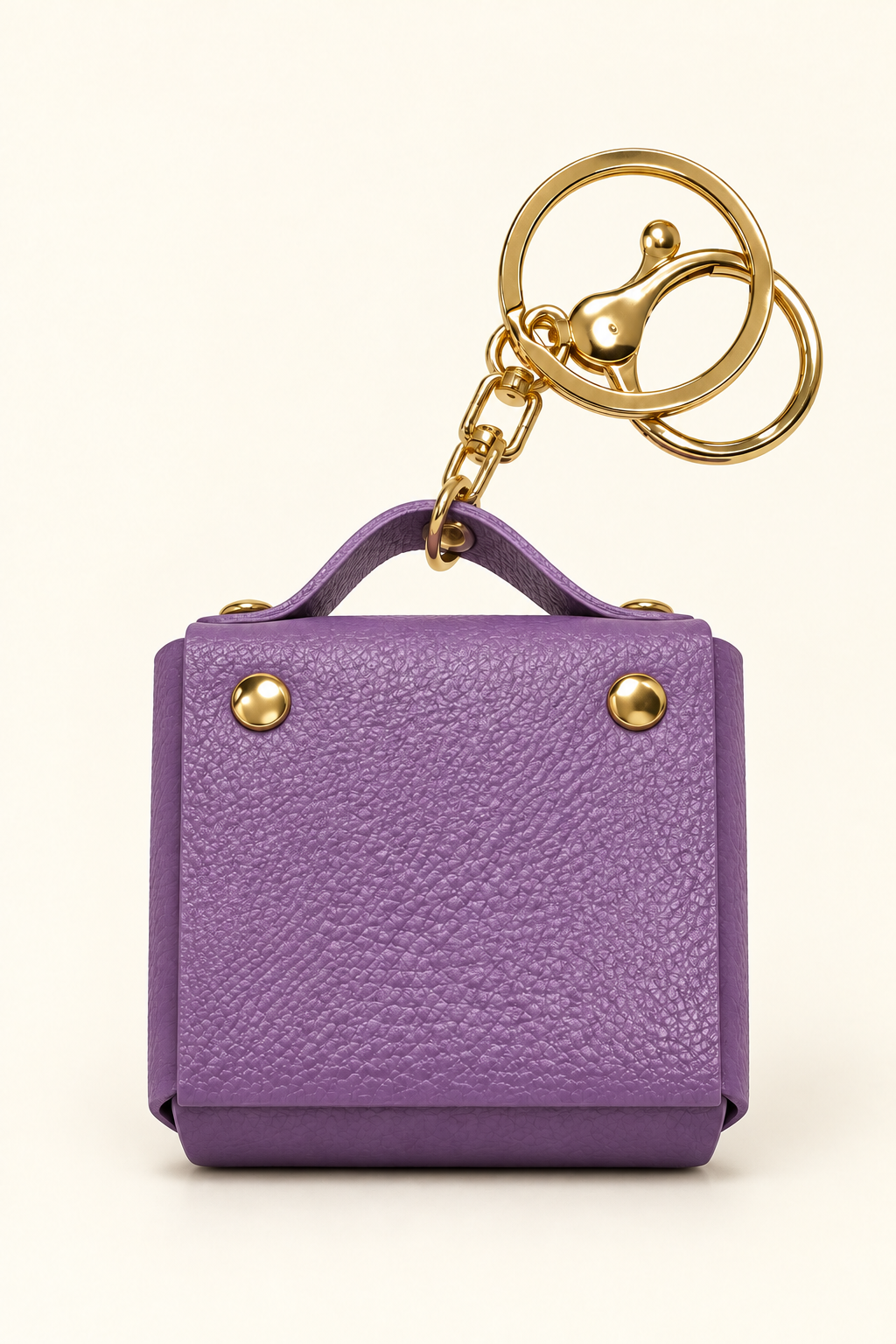 Purple mini coin purse keychain with gold-tone hardware