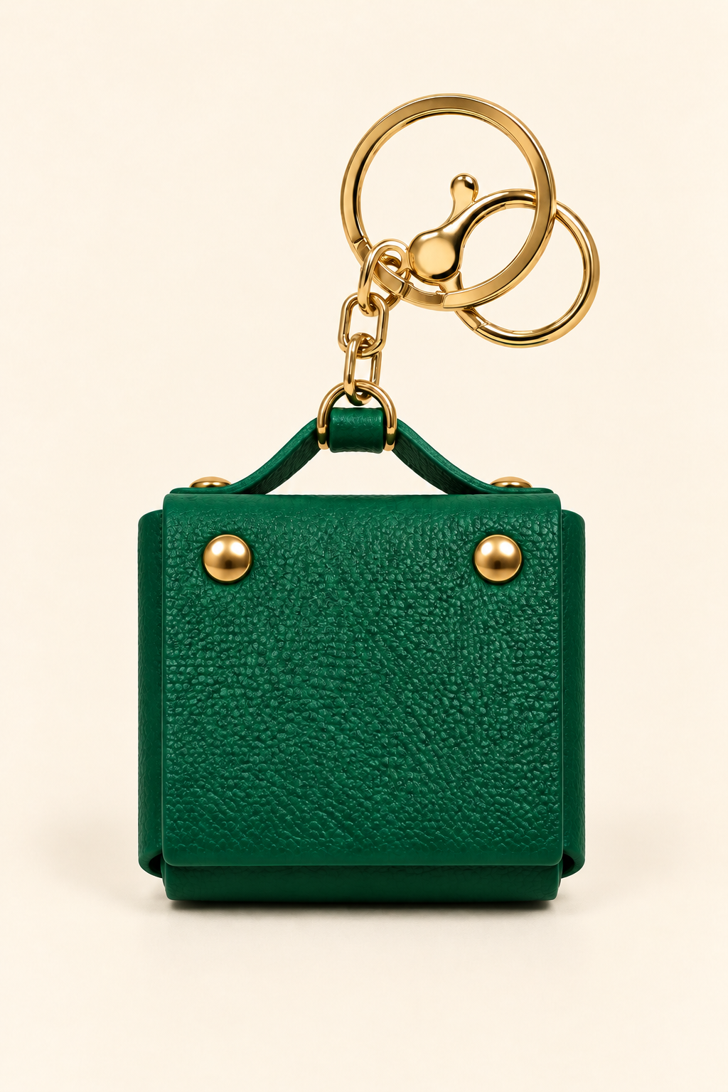 Green mini coin purse keychain with gold-tone hardware