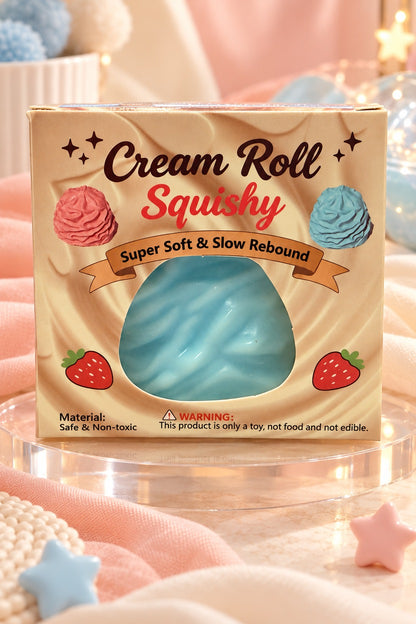 Blue Cream Roll Squishy in its retail package on a warm styled display