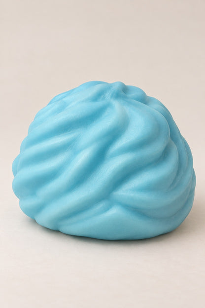 Blue Cream Roll Squishy unboxed, swirled texture