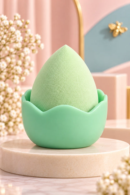 Mint Green makeup sponge in its plain coordinating stand, shown unpackaged; one boxed set per purchase
