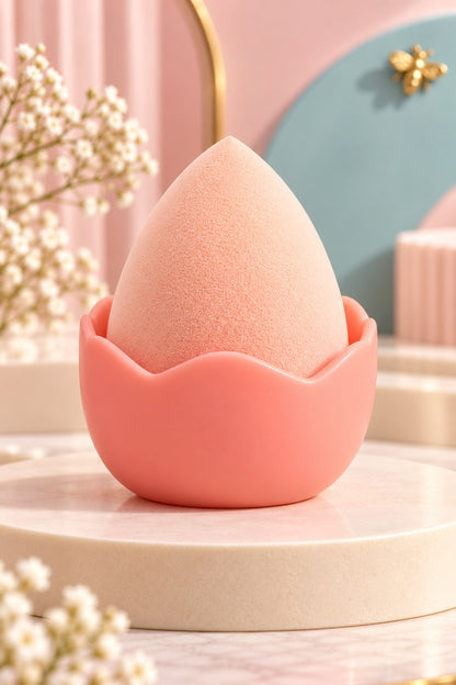 Peach makeup sponge in its plain coordinating stand, shown unpackaged; one boxed set per purchase