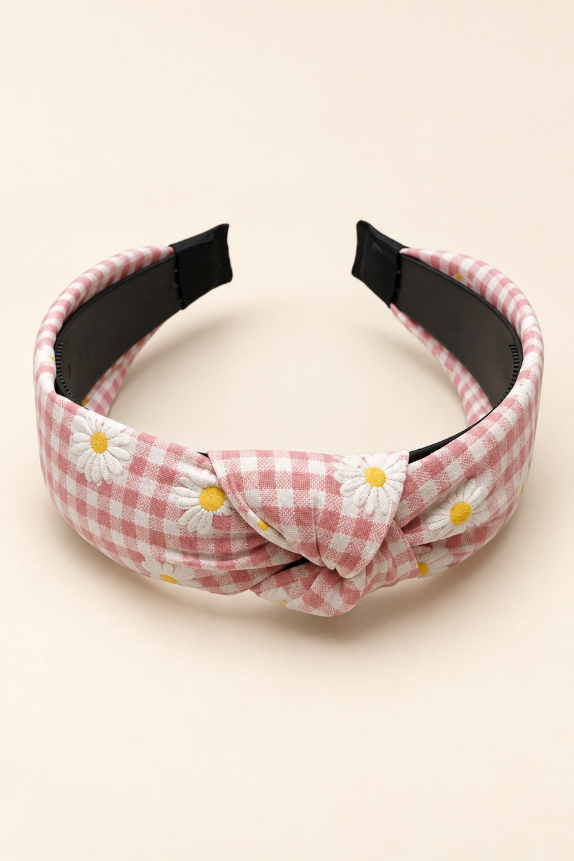Pink Ellas daisy gingham top-knot horseshoe headband with white daisies and yellow centers, black underside and covered tips