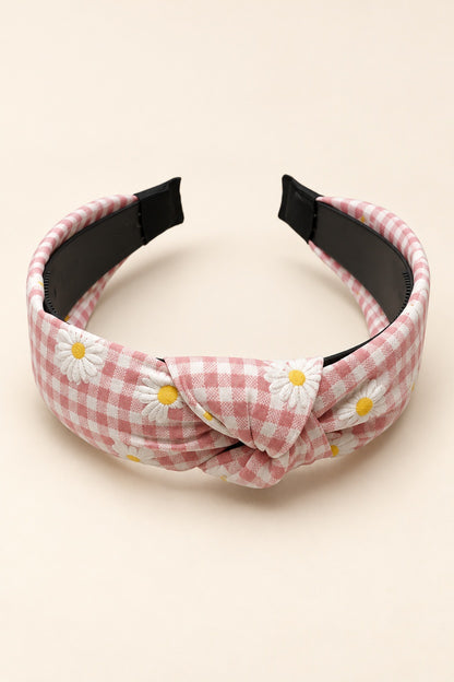 Pink Ellas daisy gingham top-knot horseshoe headband with white daisies and yellow centers, black underside and covered tips