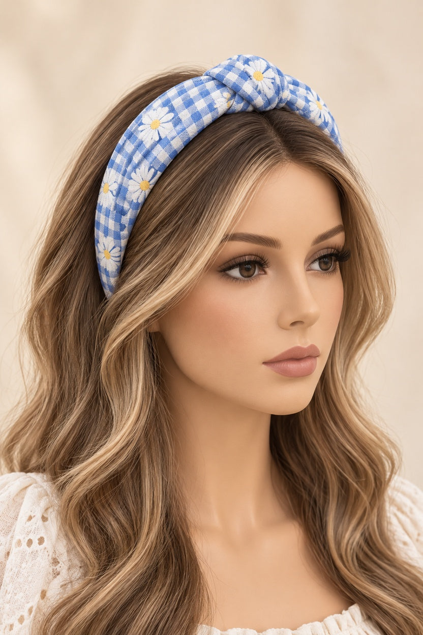 Blue daisy gingham top-knot headband worn on a long-haired mannequin