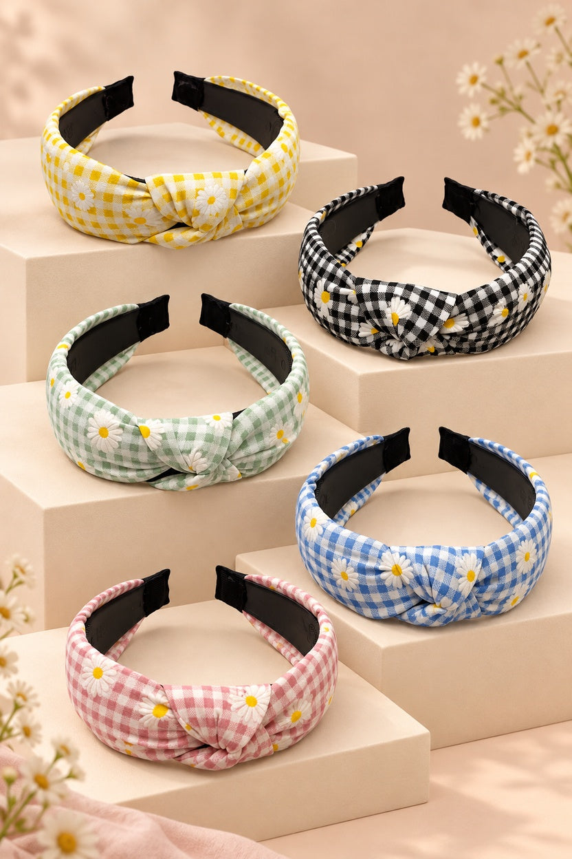 Five Ellas daisy gingham top-knot headbands in yellow, black, mint green, blue and pink on cream boutique display tiers