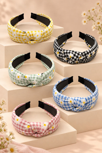 Five Ellas daisy gingham top-knot headbands in yellow, black, mint green, blue and pink on cream boutique display tiers