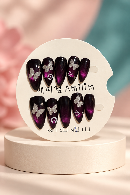 Midnight Butterfly Cat-Eye Press-On / Glue-On Nails – Long Almond; original manufacturer card displayed without outer wrapper on a cream studio plinth