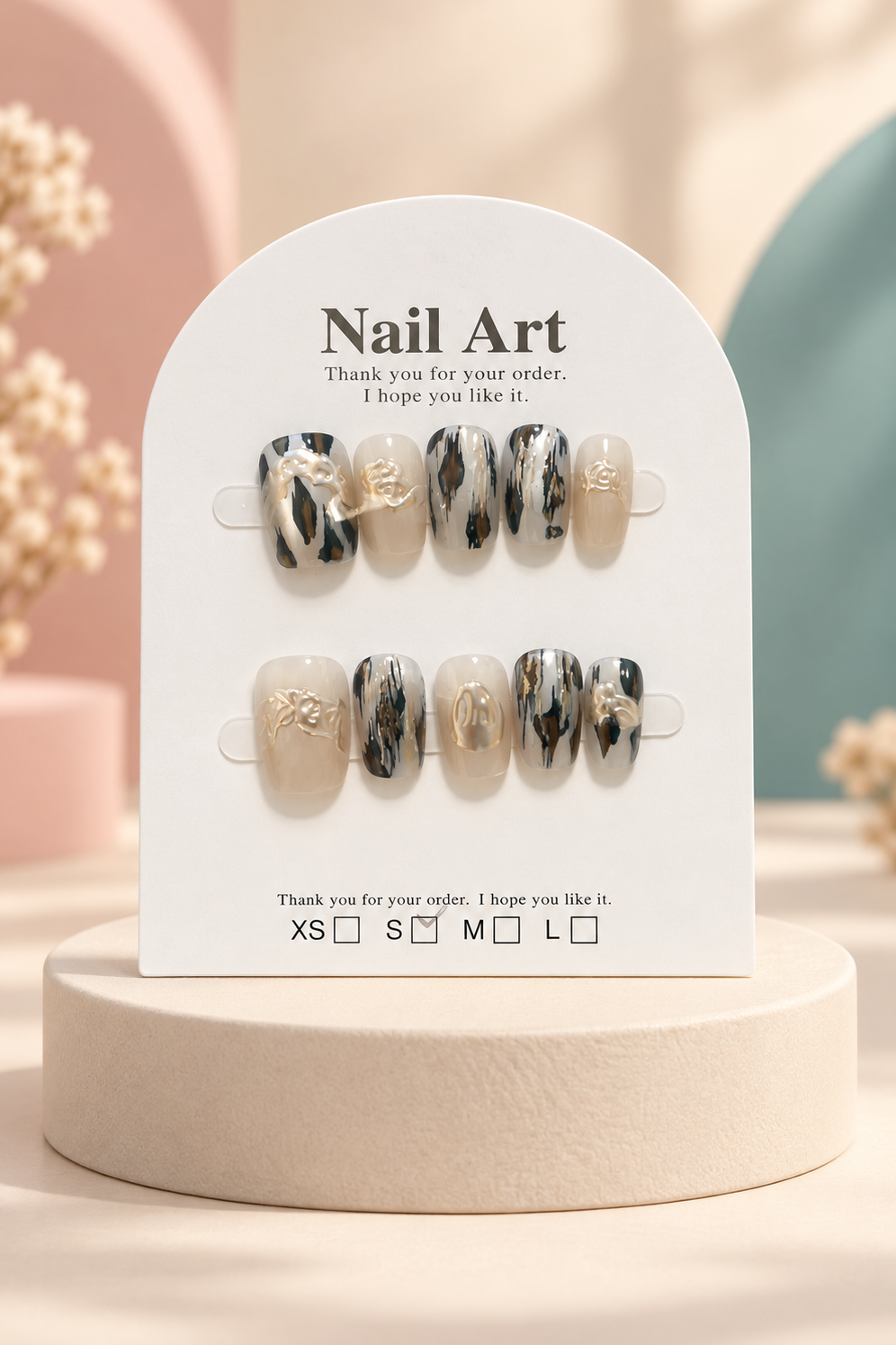 Ivory Cheetah Print Press-On / Glue-On Nails – Size S; original manufacturer card displayed without outer wrapper on a cream studio plinth