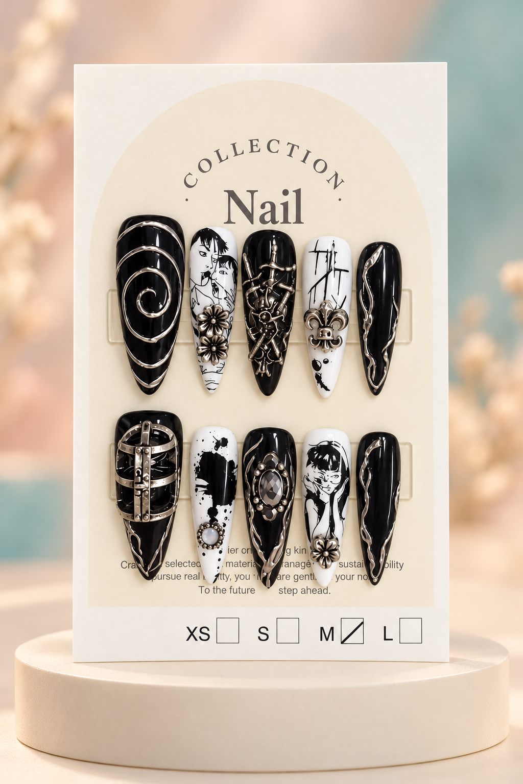 Original manufacturer card displaying black white illustrated silver accent stiletto nails on cream plinth without wrapper
