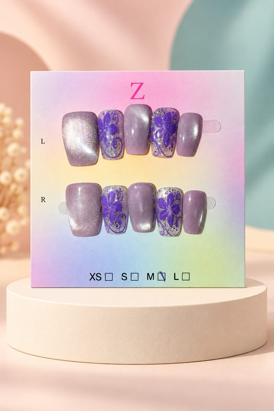 Purple Floral Shimmer Press-On / Glue-On Nails – Squoval Size M; original manufacturer card displayed without outer wrapper on a cream studio plinth