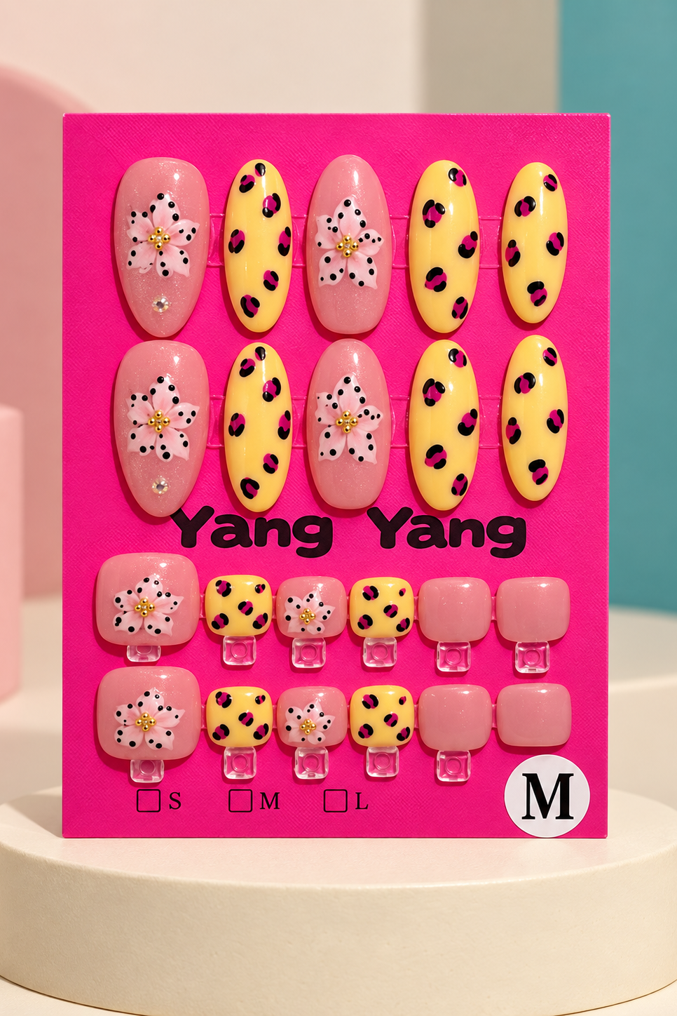 Pink Floral Yellow Leopard Press-On / Glue-On Nails – Almond Size M; original manufacturer card displayed without outer wrapper on a cream studio plinth