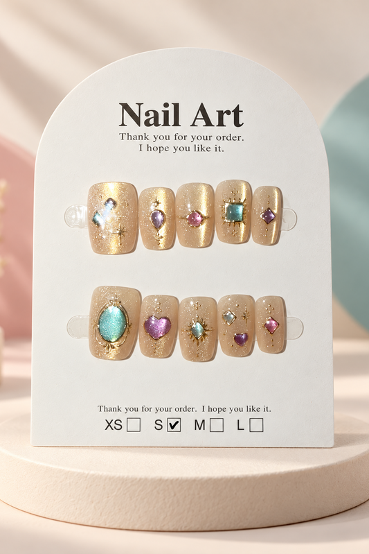 Champagne Jewel Accent Press-On / Glue-On Nails – Soft Square Size S; original manufacturer card displayed without outer wrapper on a cream studio plinth