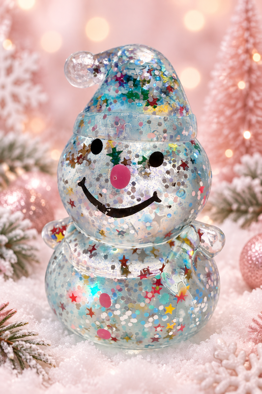 Glitter snowman sugar squeezy toy on pastel Christmas background
