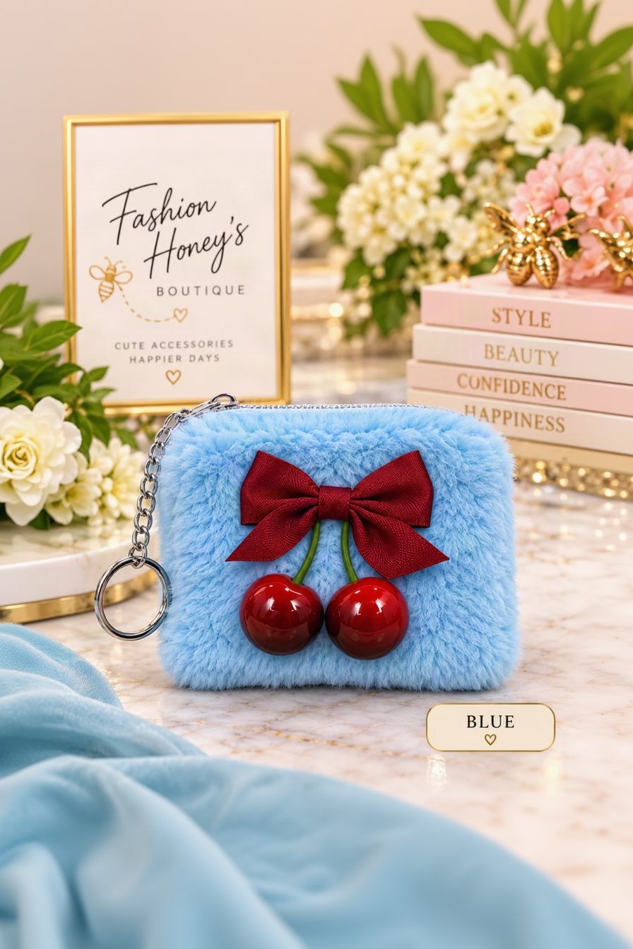 Blue fuzzy cherry pouch keychain