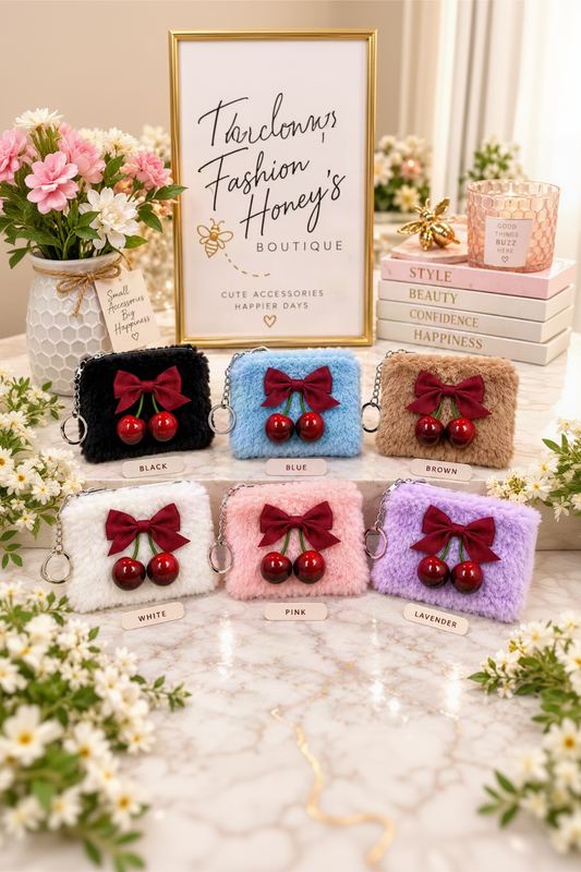 Six fuzzy cherry pouch keychain colors arranged in two uniform rows