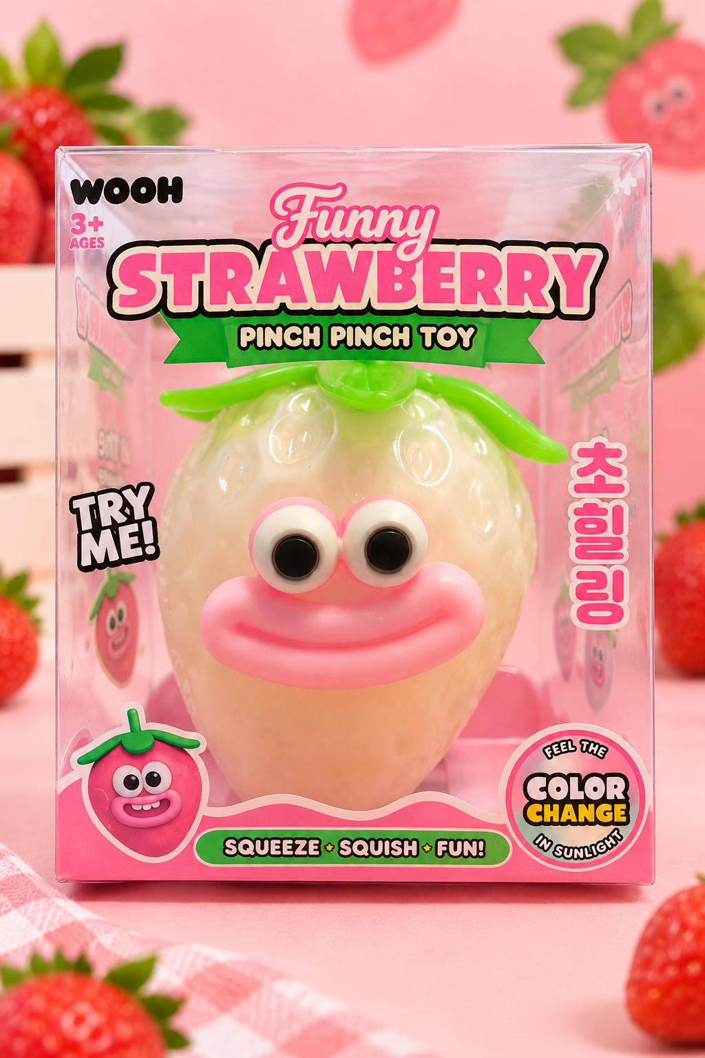Funny Strawberry Pinch Pinch Toy in clear retail box packaging