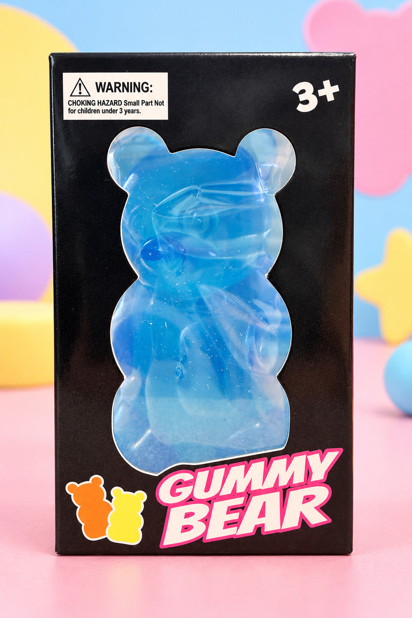 Blue Gummy Bear squishy toy in its black window box, ages 3 and up
