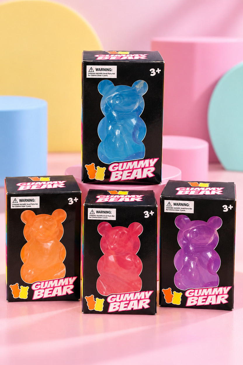 Four individually boxed Gummy Bear squishy toys in orange, pink, blue and purple