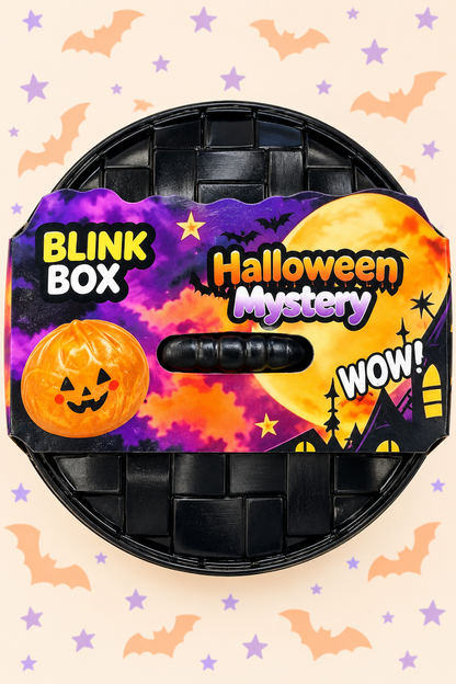 Halloween Mystery Blink Box dumpling squishy in original closed packaging on a pastel Halloween background
