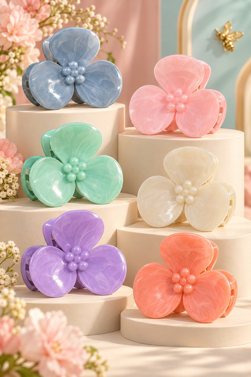 Melody three-petal flower claw hair clips in blue, pink, ivory, mint green, lavender and coral on boutique risers