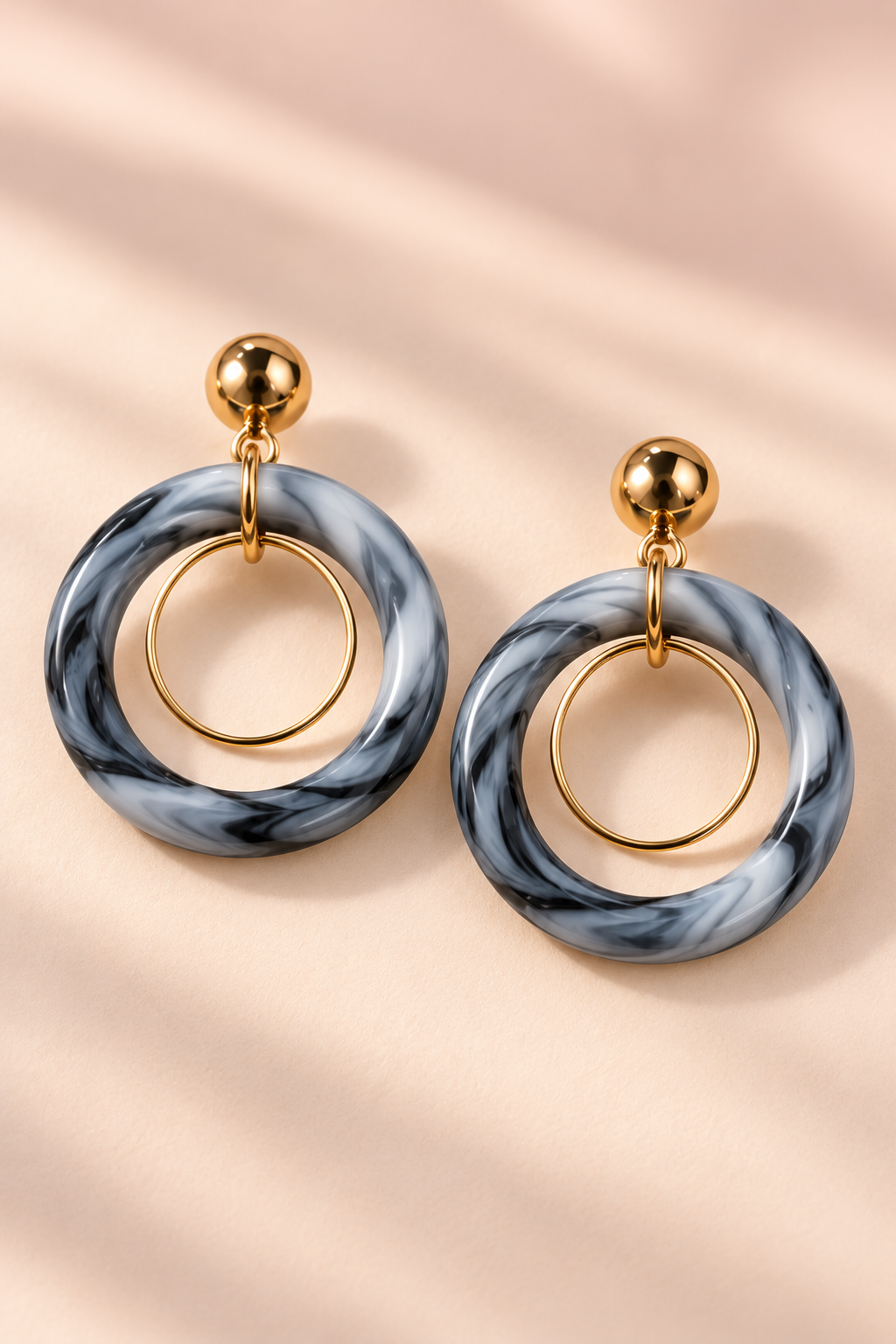 MINT Gray double hoop earring pair with thin gold-tone inner loops and round gold-tone studs