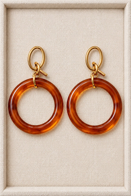 Amber Brown MINT earrings with single round plastic hoops and gold-tone oval fronts