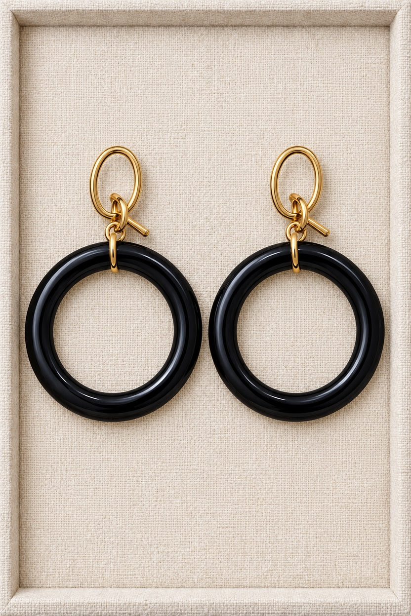 Black MINT earrings with single round plastic hoops and gold-tone oval fronts