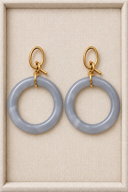 Gray MINT earrings with single round plastic hoops and gold-tone oval fronts
