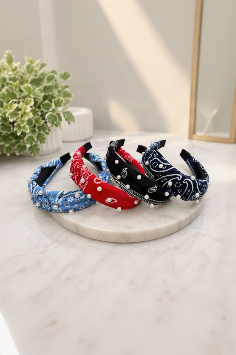 Four pearl embellished paisley bandana headbands displayed together