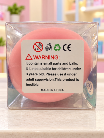 Pink soap squishy packaging with upright readable warning label