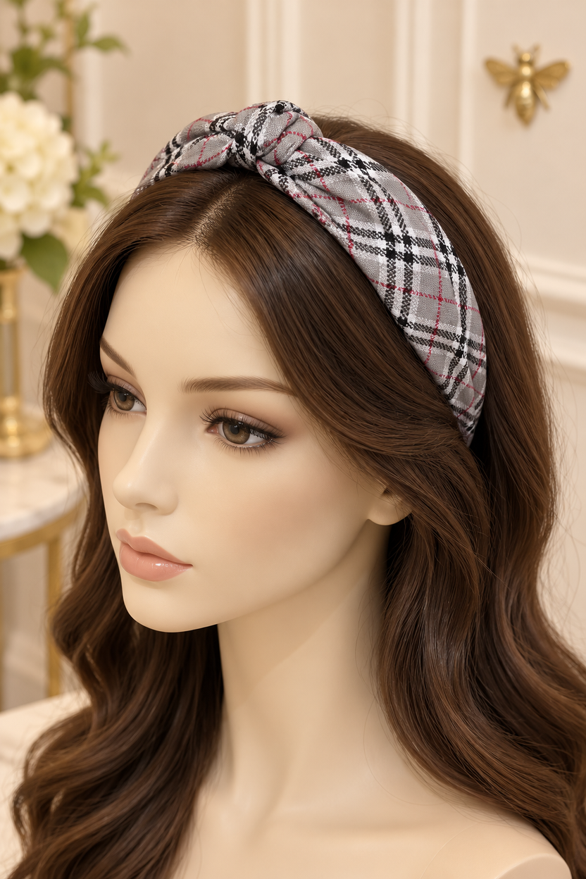 Gray plaid top-knot headband displayed on a long-haired mannequin