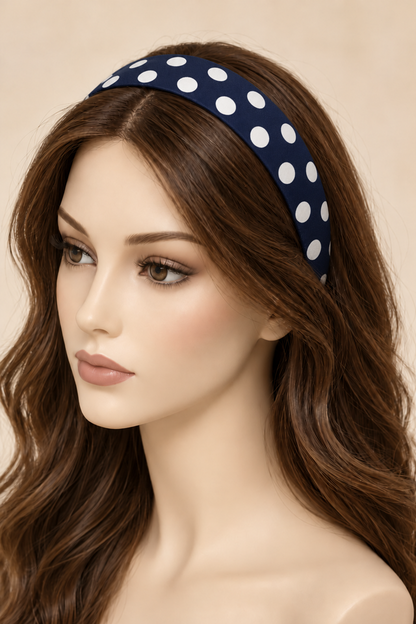 navy flat white polka-dot headband with two rows of dots on long hair
