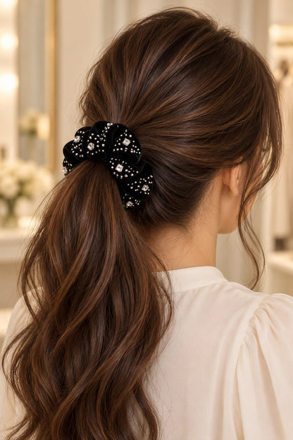 Black rhinestone-trim scrunchie worn in a brunette ponytail
