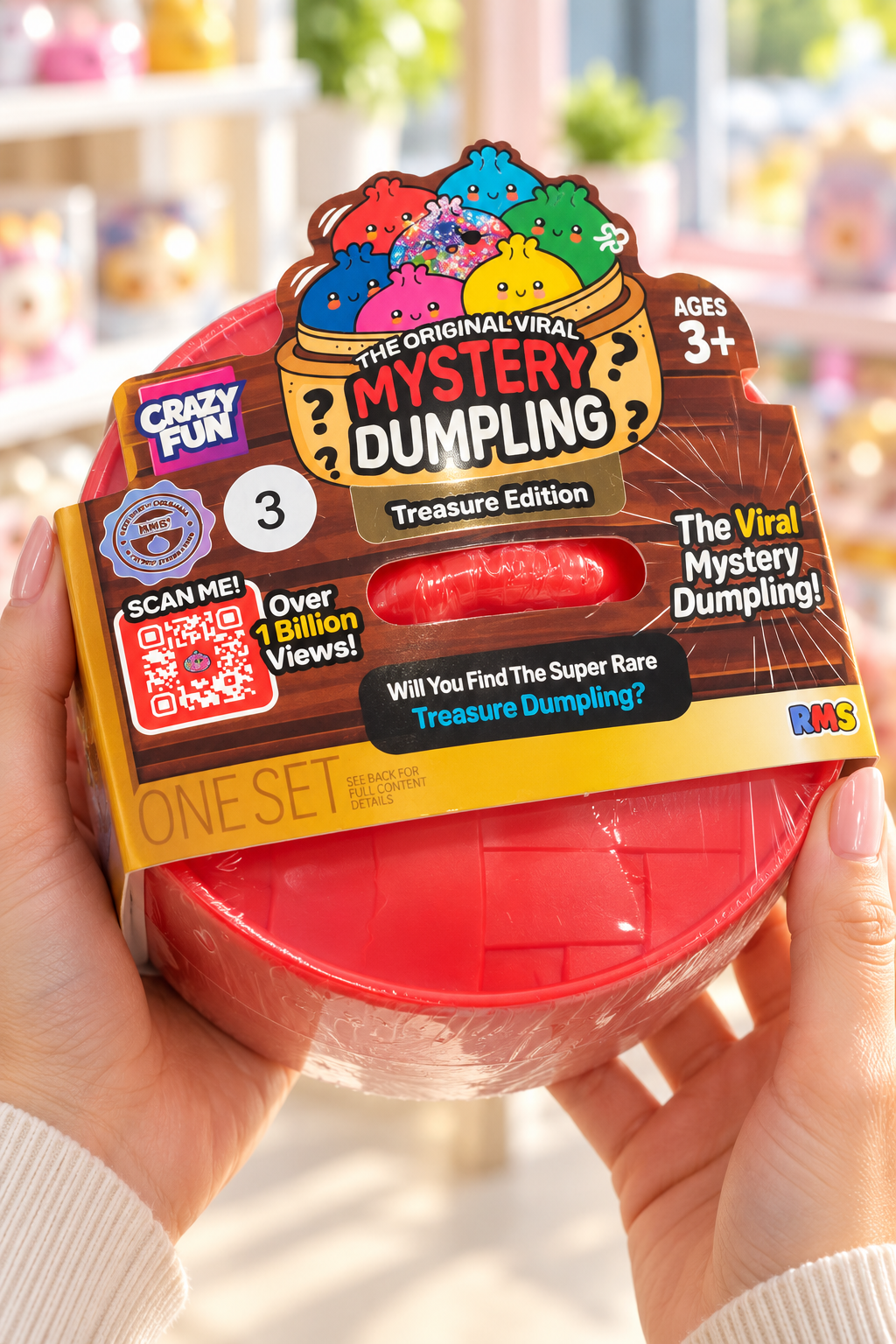 Adult holding the sealed Crazy Fun RMS Treasure Edition mystery dumpling package.