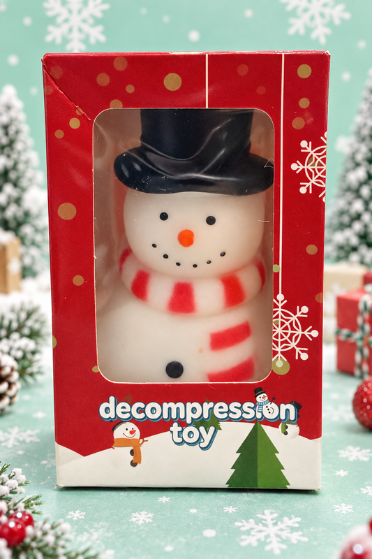 Snowman squishy in its burgundy window retail box on a winter display.