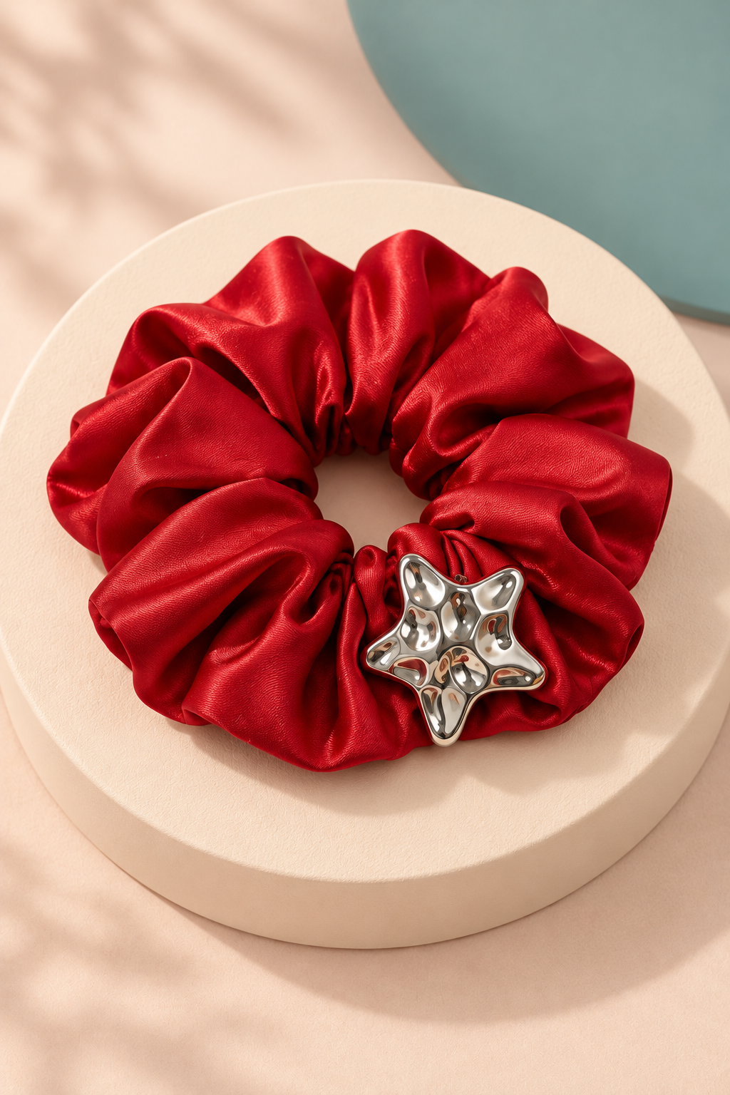 Red Melody star-accent scrunchie with neatly arranged gathered fabric