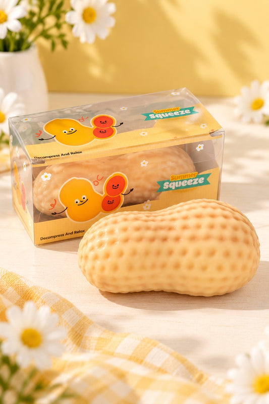 Peanut squishy beside its Summer Squeeze retail box